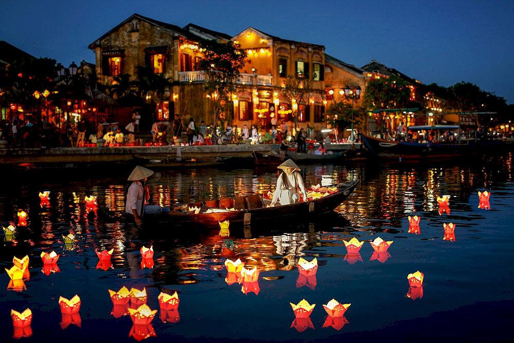 Enjoy a lantern boat for a ride along the Hoai River 